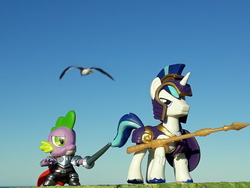 Size: 4128x3096 | Tagged: safe, artist:dingopatagonico, shining armor, spike, pony, g4, armor, guardians of harmony, irl, it's coming right at us, misadventures of the guardians, photo, spear, this will end in pain, toy, weapon