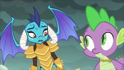 Size: 1280x720 | Tagged: safe, screencap, princess ember, spike, dragon, g4, gauntlet of fire, armor, confused, discovery family logo, dragon armor, dragon lands, dragoness, duo, female, male
