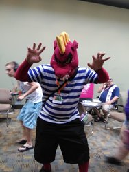 Size: 3120x4160 | Tagged: safe, garble, human, bronycon, bronycon 2019, g4, clothes, cosplay, costume, fursuit head, irl, irl human, photo