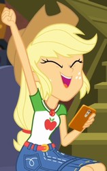 Size: 531x843 | Tagged: safe, screencap, applejack, costume conundrum, equestria girls, equestria girls series, g4, spoiler:eqg series (season 2), cellphone, cropped, female, fist in the air, geode of super strength, iphone, magical geodes, phone, sitting, smartphone, smiling, solo, sunset's apartment