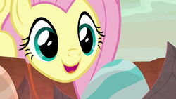 Size: 1280x720 | Tagged: safe, screencap, fluttershy, pegasus, pony, g4, sweet and smoky, cute, dragon egg, dragon lands, egg, excited, female, mare, open mouth, smiling, solo, talking to objects