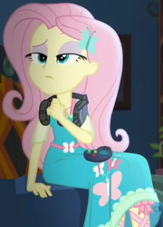 Size: 687x955 | Tagged: safe, screencap, fluttershy, costume conundrum, equestria girls, g4, my little pony equestria girls: choose your own ending, controller, couch, cropped, cute, female, gaming headset, geode of fauna, headset mic, looking up, magical geodes, raised eyebrow, sitting, solo, sunset's apartment, thinking
