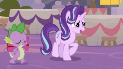 Size: 600x338 | Tagged: safe, screencap, spike, starlight glimmer, dragon, pony, g4, the last problem, leak, animated, cute, duo, female, gif, male, mare, present, winged spike, wings