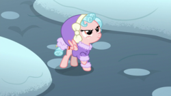 Size: 1920x1080 | Tagged: safe, screencap, cozy glow, pegasus, pony, frenemies (episode), g4, clothes, cozy glow is not amused, female, filly, foal, hat, raised hoof, snow, solo, winter outfit