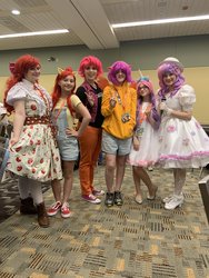 Size: 1536x2048 | Tagged: safe, artist:maddymoiselle, artist:sarahndipity cosplay, artist:shelbeanie, apple bloom, scootaloo, sweetie belle, human, bronycon, bronycon 2019, g4, clothes, converse, cosplay, costume, cutie mark crusaders, dress, irl, irl human, peace sign, photo, shoes, sneakers, vans