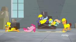 Size: 1920x1080 | Tagged: safe, screencap, cheese sandwich, doctor hoozonfurst, pinkie pie, summermint, earth pony, pony, g4, the last laugh, background pony, banana peel, discovery family logo, factory, falling, female, gag factory, lying down, male, mare, slipping, smiling, stallion, unnamed character, unnamed pony
