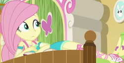 Size: 598x306 | Tagged: safe, screencap, angel bunny, fluttershy, do it for the ponygram!, equestria girls, equestria girls series, g4, spoiler:eqg series (season 2), bed, book, cropped, cute, female, fluttershy's bedroom, geode of fauna, in bed, legs, looking up, magical geodes, sandals, shyabetes, solo