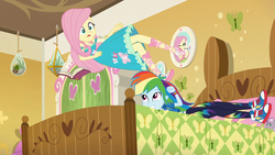 Size: 1920x1080 | Tagged: safe, screencap, angel bunny, fluttershy, rainbow dash, do it for the ponygram!, equestria girls, g4, my little pony equestria girls: better together, bed, book, dive bomb, duo, duo female, female, fluttershy's bedroom, geode of fauna, geode of super speed, magical geodes, shoes, smiling, sneakers