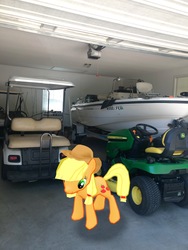 Size: 3024x4032 | Tagged: safe, gameloft, photographer:undeadponysoldier, applejack, earth pony, pony, g4, augmented reality, boat, female, garage, golf cart, hat, irl, john deere, lawn mower, mare, photo, ponies in real life
