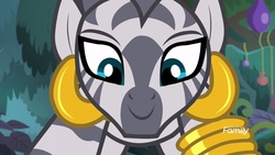 Size: 1920x1080 | Tagged: safe, screencap, zecora, pony, g4, she talks to angel, bracelet, close-up, ear piercing, earring, everfree forest, female, jewelry, looking at you, looking down, piercing, quadrupedal, smiling, solo, zecora's hut