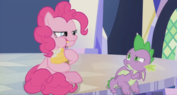Size: 1600x864 | Tagged: safe, screencap, pinkie pie, spike, dragon, pony, g4, the last laugh, cupcake, eating, food, munching, plastic, silly, silly pony, sitting, table, twilight's castle, weirded out, winged spike, wings