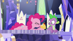 Size: 1920x1080 | Tagged: safe, screencap, pinkie pie, spike, dragon, earth pony, pony, g4, the last laugh, claws, cupcake, cutie map, female, food, friendship throne, male, mare, prone, twilight's castle, winged spike, wings