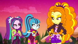Size: 1918x1080 | Tagged: safe, screencap, adagio dazzle, aria blaze, sonata dusk, equestria girls, equestria girls series, g4, sunset's backstage pass!, spoiler:eqg series (season 2), clothes, crossed arms, dress, female, hand on hip, minidress, outdoors, pigtails, ponytail, raised eyebrow, shorts, spiked wristband, taco dress, the dazzlings, trio, trio female, twintails, wristband