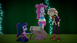 Size: 1915x1080 | Tagged: safe, screencap, pinkie pie, sci-twi, sunset shimmer, twilight sparkle, equestria girls, equestria girls specials, g4, my little pony equestria girls: better together, my little pony equestria girls: sunset's backstage pass, boots, box, candy, cardboard box, clothes, eating, female, food, glasses, hedge maze, maze, music festival outfit, neon garden maze, ponytail, shoes, trap (device), trio, trio female