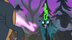 Size: 1280x720 | Tagged: safe, screencap, queen chrysalis, changeling, changeling queen, ophiotaurus, frenemies (episode), g4, changeling feeding, draining, fangs, female, forest, forked tongue, glowing horn, horn, love, magic, open mouth, pine tree, tree, you know for kids