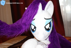 Size: 1601x1067 | Tagged: safe, artist:ponimalion, rarity, pony, unicorn, g4, bed, bedroom, bedroom eyes, female, horn, irl, looking at you, photo, plushie, solo