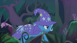 Size: 1280x720 | Tagged: safe, screencap, trixie, pony, unicorn, g4, student counsel, cape, clothes, female, forest, hat, mare, solo, trixie's cape, trixie's hat