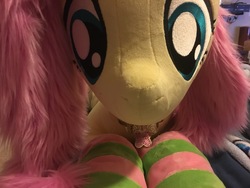 Size: 4032x3024 | Tagged: safe, artist:natureshy, artist:qtpony, fluttershy, pony, g4, clothes, cute, element of kindness, front view, irl, jewelry, life size, necklace, photo, plushie, socks, solo, striped socks