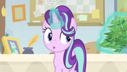 Size: 1600x900 | Tagged: safe, screencap, phyllis, starlight glimmer, pony, unicorn, a horse shoe-in, g4, bulletin board, desk, female, inkwell, levitation, magic, mare, office, philodendron, picture frame, quill, telekinesis, watering can