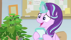 Size: 1600x900 | Tagged: safe, screencap, phyllis, starlight glimmer, pony, unicorn, a horse shoe-in, g4, bulletin board, female, house plant, levitation, magic, mare, nervous smile, office, philodendron, picture frame, telekinesis
