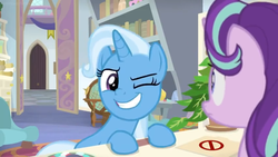 Size: 1600x900 | Tagged: safe, screencap, phyllis, starlight glimmer, trixie, pony, unicorn, a horse shoe-in, g4, bookshelf, desk, door, female, folder, house plant, mare, mints, office, one eye closed, philodendron, picture frame, scroll, shelf, wink