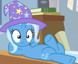Size: 1189x980 | Tagged: safe, screencap, trixie, pony, unicorn, a horse shoe-in, g4, anatomically incorrect, belly, classroom, clothes, cropped, crossed legs, desk, discovery family logo, female, hat, incorrect leg anatomy, interrupted, mare, on back, reclining, shrunken pupils, solo, surprised, trixie's hat, wide eyes