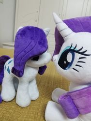 Size: 1440x1920 | Tagged: safe, artist:nekokevin, rarity, pony, unicorn, g4, 4de, duality, duo, female, imminent noseboop, irl, looking at each other, lying down, mare, photo, plushie, self ponidox, size difference, smiling
