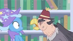 Size: 1588x896 | Tagged: safe, screencap, grampa gruff, trixie, griffon, pony, unicorn, a horse shoe-in, g4, breath, cape, clothes, duo, eyes closed, female, hat, male, mare, trixie's cape, trixie's hat, wide eyes, yelling