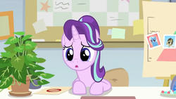 Size: 1600x900 | Tagged: safe, screencap, doctor whooves, phyllis, starlight glimmer, time turner, trixie, pony, unicorn, a horse shoe-in, g4, bulletin board, desk, female, folder, house plant, mare, mints, office, philodendron, photos