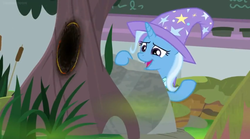 Size: 1600x888 | Tagged: safe, screencap, trixie, pony, a horse shoe-in, g4, bog, burnt, cattails, chalkboard, female, grass, mare, nervous smile, reeds, rock, solo, tree