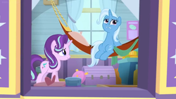 Size: 1600x900 | Tagged: safe, screencap, starlight glimmer, trixie, pony, unicorn, a horse shoe-in, g4, belly, box, chest, cushion, duo, duo female, female, hammock, mare, pillow, sitting, trixie's wagon, window