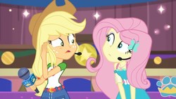 Size: 1280x720 | Tagged: safe, screencap, applejack, fluttershy, best in show: the victory lap, equestria girls, g4, my little pony equestria girls: better together, applejack's hat, cowboy hat, female, hat, microphone, photo
