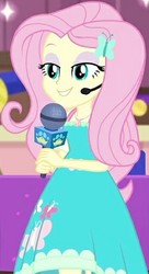 Size: 229x421 | Tagged: safe, screencap, fluttershy, best in show: the victory lap, equestria girls, g4, my little pony equestria girls: better together, cropped, eyeshadow, female, fluttershy boho dress, geode of fauna, headset, headset mic, lidded eyes, magical geodes, makeup, microphone, smiling, solo