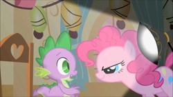 Size: 1280x720 | Tagged: safe, screencap, pinkie pie, spike, dragon, earth pony, pony, g4, party of one, chair, duo, female, interrogation, lamp, looking at each other, male, mare, smiling, smirk, smug, sugarcube corner