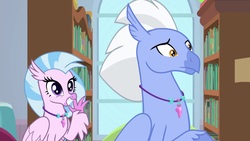 Size: 1920x1080 | Tagged: safe, screencap, silverstream, sky beak, classical hippogriff, hippogriff, a horse shoe-in, g4, bookshelf, claws, confused, cute, diastreamies, duo, father and daughter, female, frown, grin, jewelry, male, necklace, pearl necklace, raised eyebrow, smiling, talons, teenager, waving