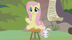 Size: 1600x900 | Tagged: safe, screencap, angel bunny, fluttershy, pony, rabbit, g4, she talks to angel, animal, checklist, duo, female, grumpy, list, male, mare, paper, sitting, stool, sweet feather sanctuary, upset