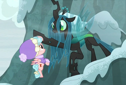 Size: 602x404 | Tagged: safe, screencap, cozy glow, queen chrysalis, frenemies (episode), g4, cheeselegs, clothes, cropped, duo, holes in wings, lifting, snow, winter outfit