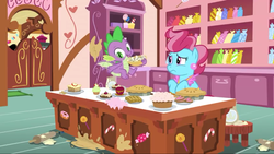 Size: 1280x720 | Tagged: safe, screencap, cup cake, spike, dragon, earth pony, pony, g4, the big mac question, claws, cupcake, female, flying, food, kitchen, male, mare, messy, messy kitchen, pie, smiling, toes, winged spike, wings