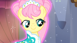 Size: 1920x1080 | Tagged: safe, screencap, fluttershy, pegasus, pony, g4, green isn't your color, alternate hairstyle, clothes, dress, female, flutterbeautiful, magic, magic aura, modelshy, solo, sparkles