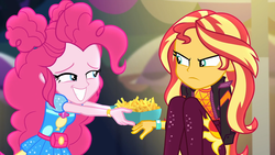 Size: 1920x1080 | Tagged: safe, screencap, pinkie pie, sunset shimmer, equestria girls, equestria girls specials, g4, my little pony equestria girls: better together, my little pony equestria girls: sunset's backstage pass, clothes, duo, duo female, female, food, french fries, geode of sugar bombs, jacket, magical geodes, music festival outfit, smiling, sunset shimmer is not amused, unamused