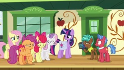 Size: 1280x720 | Tagged: safe, screencap, apple bloom, biscuit, fluttershy, scootaloo, spur, sweetie belle, twilight sparkle, alicorn, pony, g4, growing up is hard to do, cutie mark, cutie mark crusaders, guilty, older, older apple bloom, older scootaloo, older sweetie belle, saddle bag, the cmc's cutie marks, train station, twilight sparkle (alicorn)