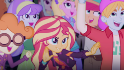 Size: 1280x720 | Tagged: safe, screencap, aqua blossom, drama letter, fry lilac, golden hazel, hunter hedge, sandy cerise, scribble dee, sunset shimmer, velvet sky, watermelody, equestria girls, equestria girls series, g4, sunset's backstage pass!, spoiler:eqg series (season 2), background human, backstage pass, female, geode of empathy, happy, logo, magical geodes, male, music festival outfit, pose, smiling, surfing, wide eyes