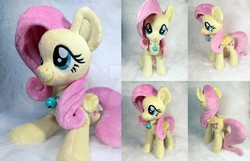 Size: 1280x825 | Tagged: safe, artist:doctorkoda, fluttershy, pony, g4, deviantart watermark, female, filly, filly fluttershy, irl, obtrusive watermark, photo, plushie, solo, watermark, younger