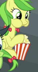 Size: 220x412 | Tagged: safe, screencap, apple fritter, yuma spurs, earth pony, pony, g4, growing up is hard to do, animated, apple family member, appleloosa resident, aweeg*, background characters doing background things, cropped, eating, female, food, popcorn, puffy cheeks