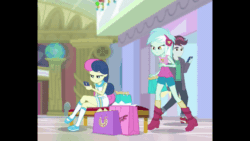 Size: 800x450 | Tagged: safe, screencap, bon bon, lyra heartstrings, sweetie drops, track starr, equestria girls, equestria girls series, g4, holidays unwrapped, spoiler:eqg series (season 2), animated, background characters doing background things, background human, bag, covering eyes, cropped, crossed legs, female, gif, guess who, happy, leaning forward, lesbian, present, seat, ship:lyrabon, shipping, shopping mall, sitting, smiling, walking