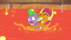 Size: 1280x720 | Tagged: safe, screencap, smolder, spike, dragon, g4, sweet and smoky, dragoness, duo, female, lava, lava pool, male, out of context, winged spike, wings