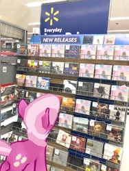 Size: 3024x4032 | Tagged: safe, gameloft, photographer:undeadponysoldier, cheerilee, earth pony, pony, g4, aladdin, augmented reality, cd, irl, photo, ponies in real life, queen (band), shopping, skillet (band), the lion king, walmart, walmart logo