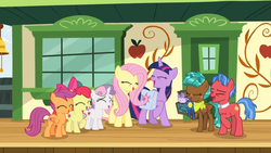 Size: 1366x768 | Tagged: safe, screencap, apple bloom, biscuit, bloofy, fluttershy, scootaloo, spur, sweetie belle, twilight sparkle, alicorn, earth pony, pegasus, pony, unicorn, whirling mungtooth, g4, growing up is hard to do, box, chest, cutie mark crusaders, door, female, filly, laughing, neckerchief, ribbon, saddle bag, teenager, train station, twilight sparkle (alicorn), window