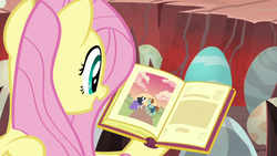 Size: 1280x720 | Tagged: safe, screencap, fluttershy, pony, g4, sweet and smoky, book, dragon egg, egg, female, mare, open book