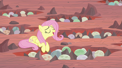 Size: 1280x720 | Tagged: safe, screencap, fluttershy, pegasus, pony, g4, sweet and smoky, dragon egg, egg, eyes closed, female, mare, prone, solo